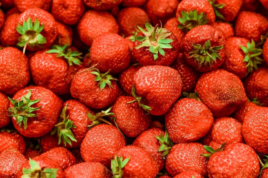 A crate of bright red strawberries